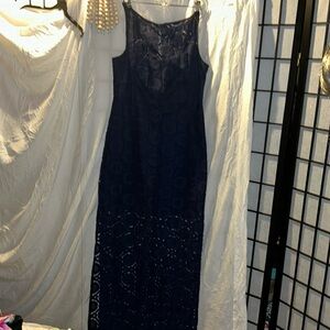 Trina Turk floor length gown size 8. Navy blue lace.